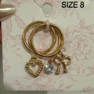 Francesca's Collections Gold Heart, Crystal & Bow Charm Stackable Rings